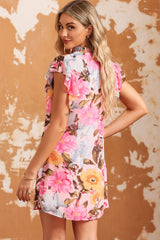 Vestido con cuello anudado y mangas abullonadas con estampado floral Kelly